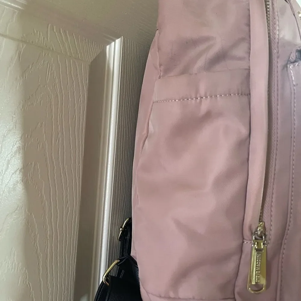Steve Madden Nylon blush pink backpack with black embroidery back straps.